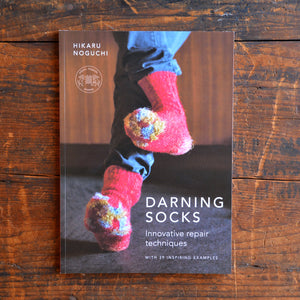 "Darning Socks: Innovative Repair Techniques" by Hikaru Noguchi