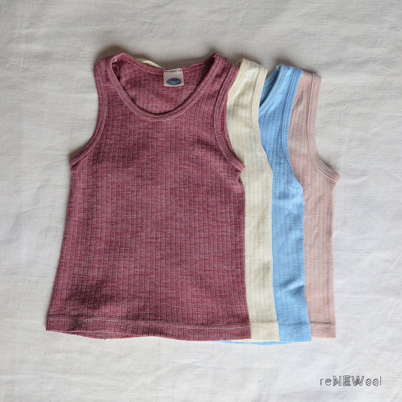 Kid's Vest Bundle 4 Pieces - Blossom (9-18m) *PRE-LOVED