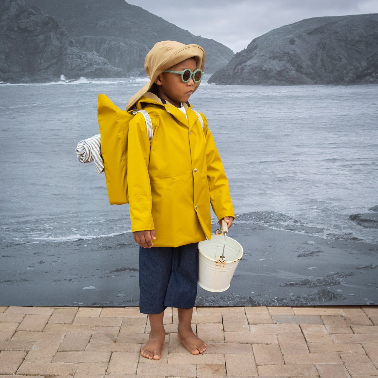 Yellow classic vintage style recycled rain coat for kids by fairechild available from Woollykins Australia New Zealand